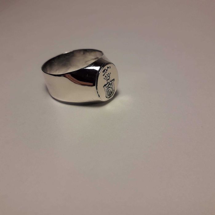 SreSrebrny sygnet z herbem Ślepowron