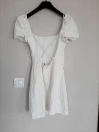 Viralowa krótka biała sukienka Zara z wiazaniem na plecach i bufkami