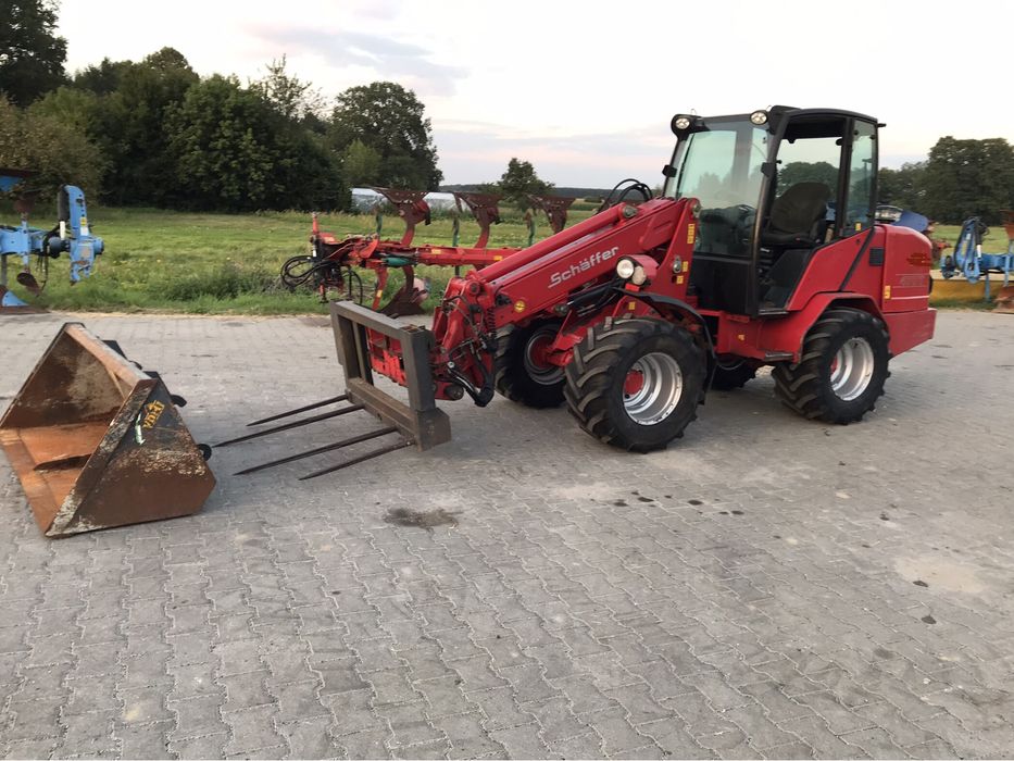 Ładowarka teleskopowa Schaffer 470 T łamana pół Weidemann zNiemiec JCB