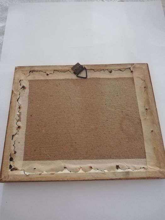 Pintura antiga com moldura dourada