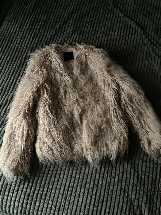 Рожева жіноча шубка