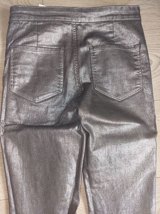 Srebrne jeansy damskie r.36 sinsay