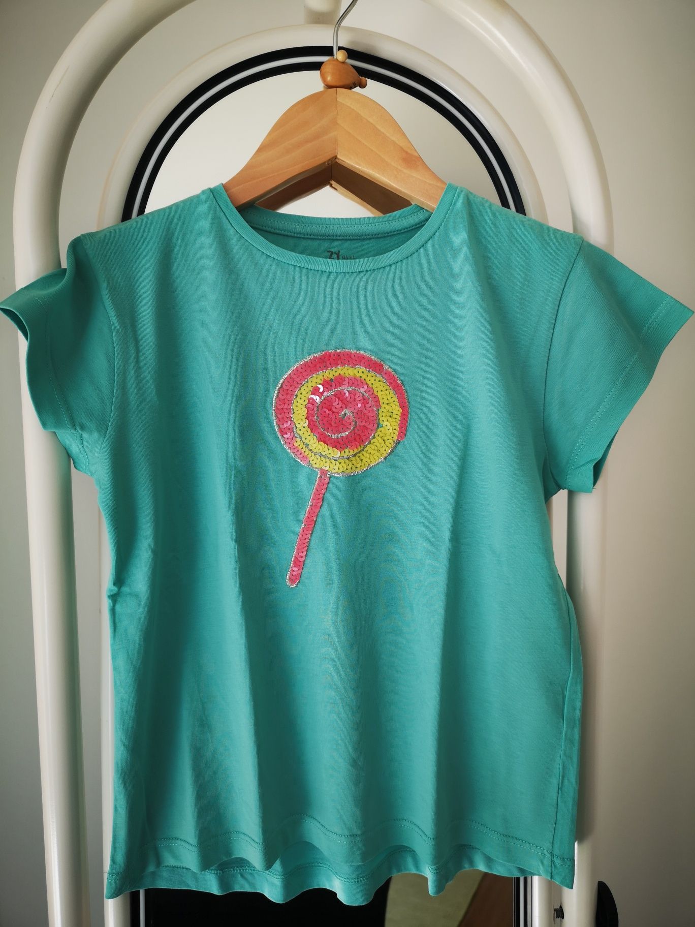 T-shirt menina verde com lollipop 7/8 anos