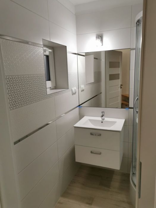 Domek z jacuzzi i sauną nad jeziorem Okuninka | J.Białe