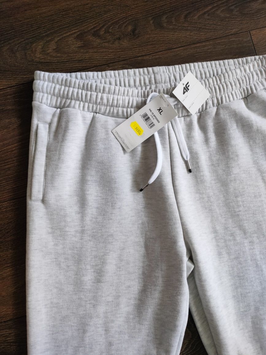 Nowe damskie spodnie dresowe 4F XL