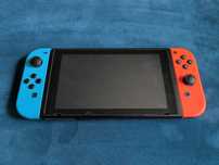 Nintendo Switch + 2 gry + etui + komplet akcesoriów – stan bdb