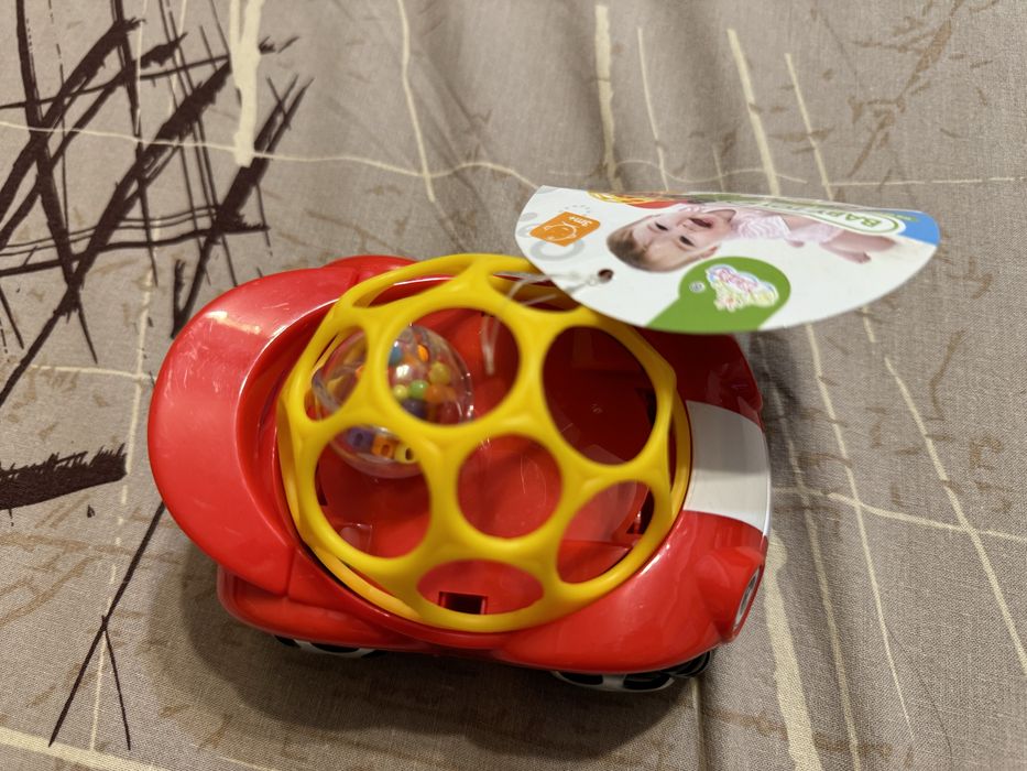 Автомобіль-брязкальце іграшка