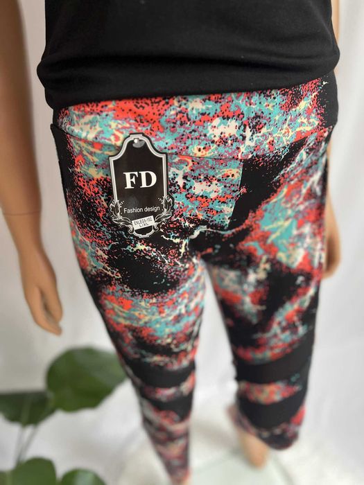 Legginsy sportowe kolorowe z siateczką L/XL nowe z metką FD