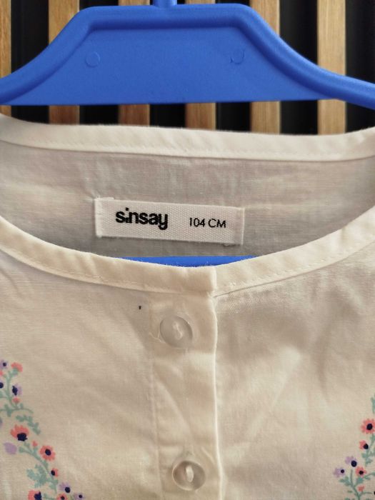 Elegancka biała bluzka dziewczęca Sinsay 104