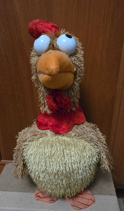 Іграшка механічна курка на батарейках