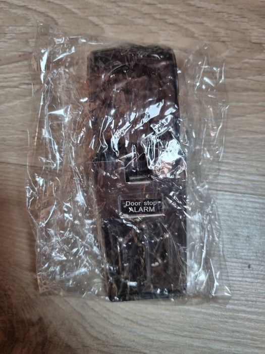 Alarm zatrzymujący drzwi,