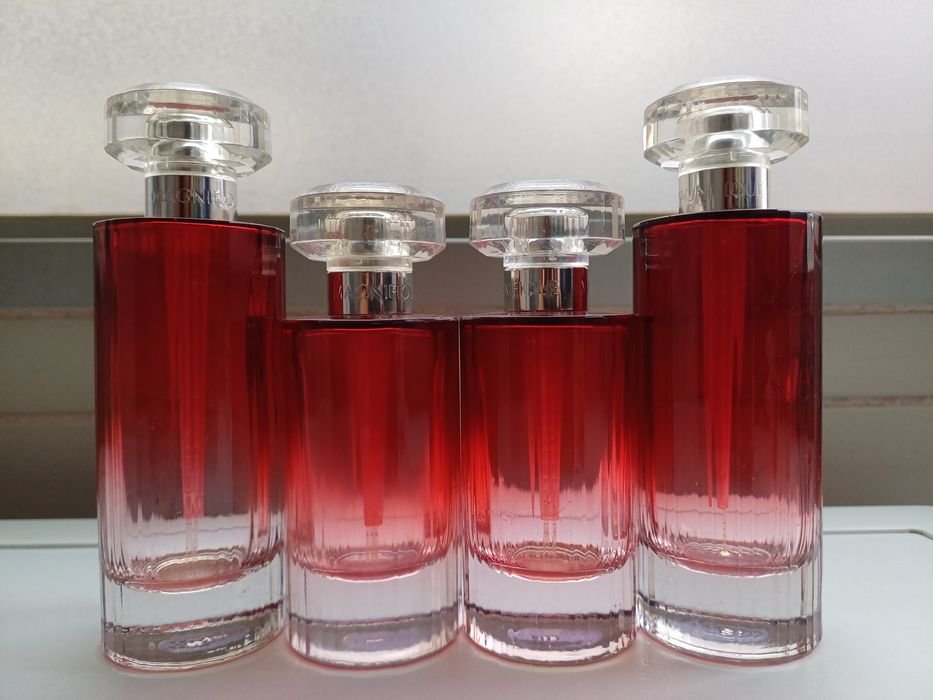 4 lindíssimos frascos (vazios) de perfume Magnifique