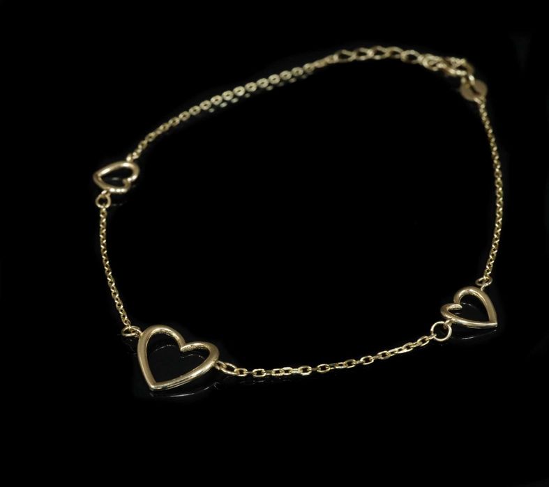 Złoto 585 - Złota bransoletka damska z serduszkami.