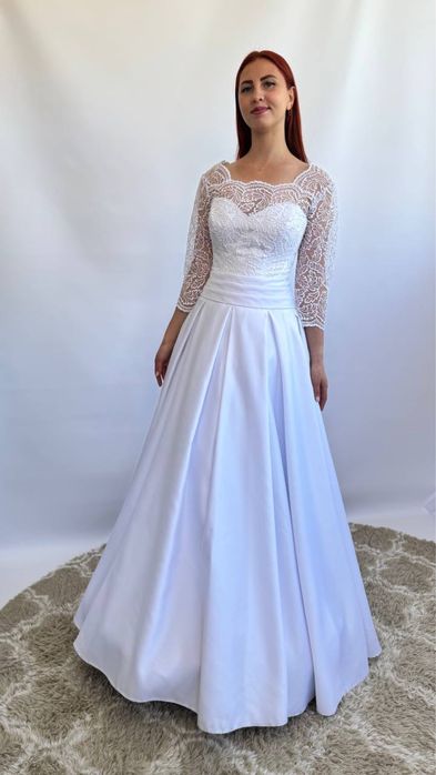 Продам весільні сукні нові