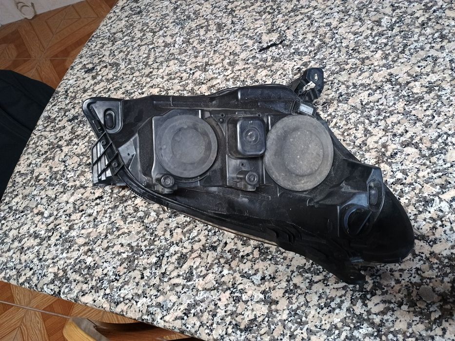 Farol ( óptica lado esquerdo) Opel astra H