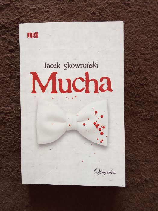 Mucha - Jacek Skowroński