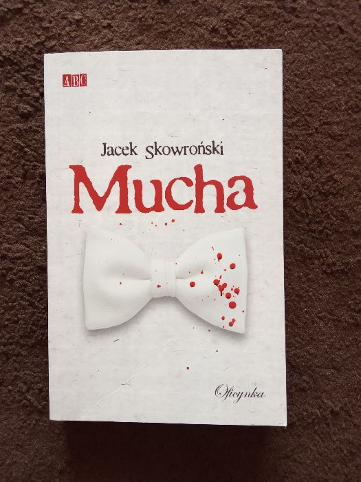 Mucha - Jacek Skowroński