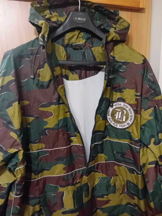 Męska przeciwdeszczowa kurtka z kapturem rozmiar XL