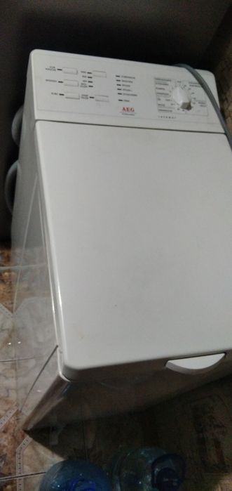 Вертикальна пральна машина