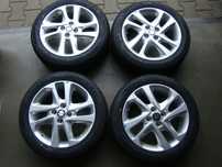 a192 4x100 Suzuki Swift Baleno 6jx16 opony lato niemontowane 185/55