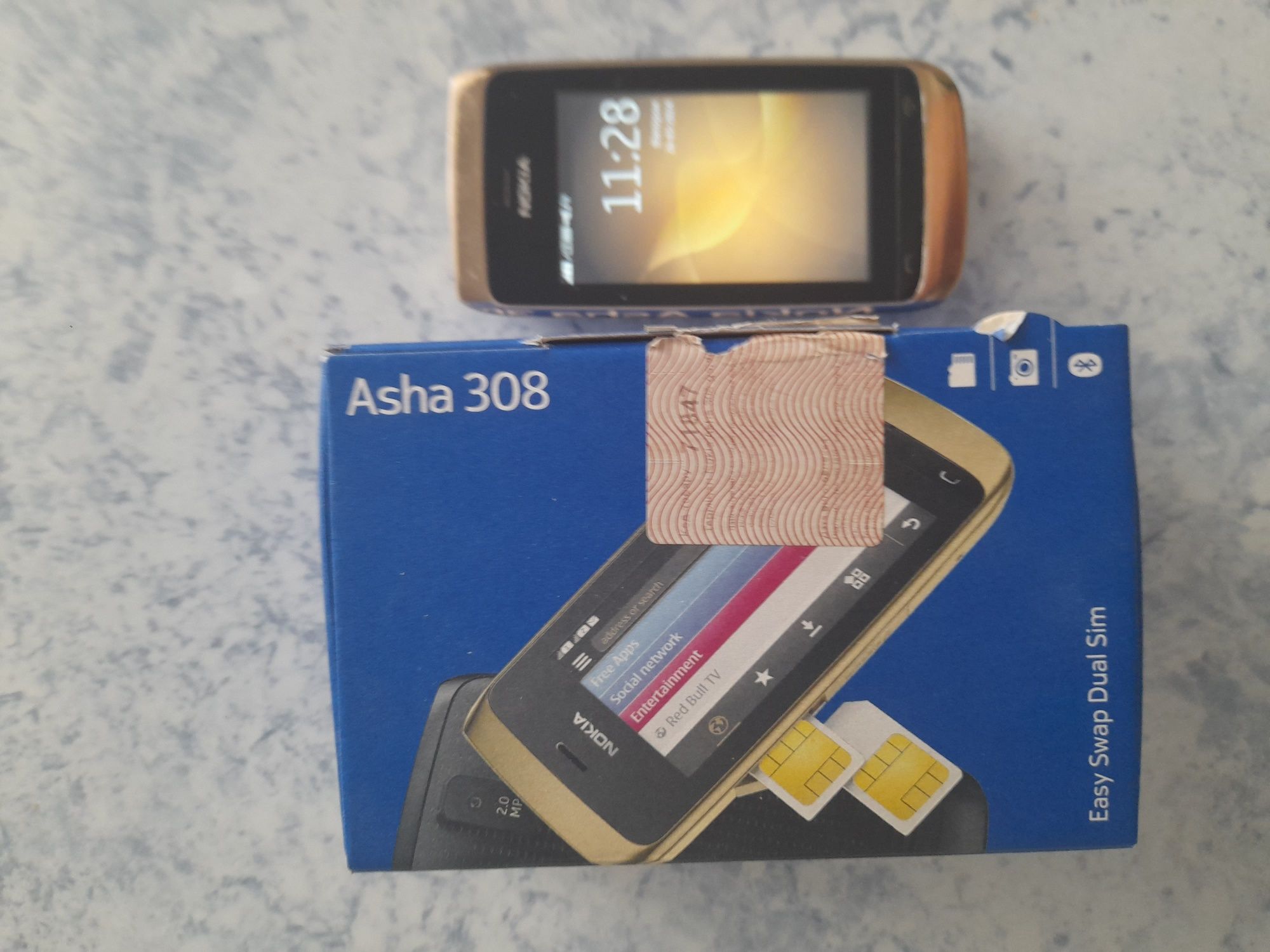 Nokia asha 308 (сенсорный).