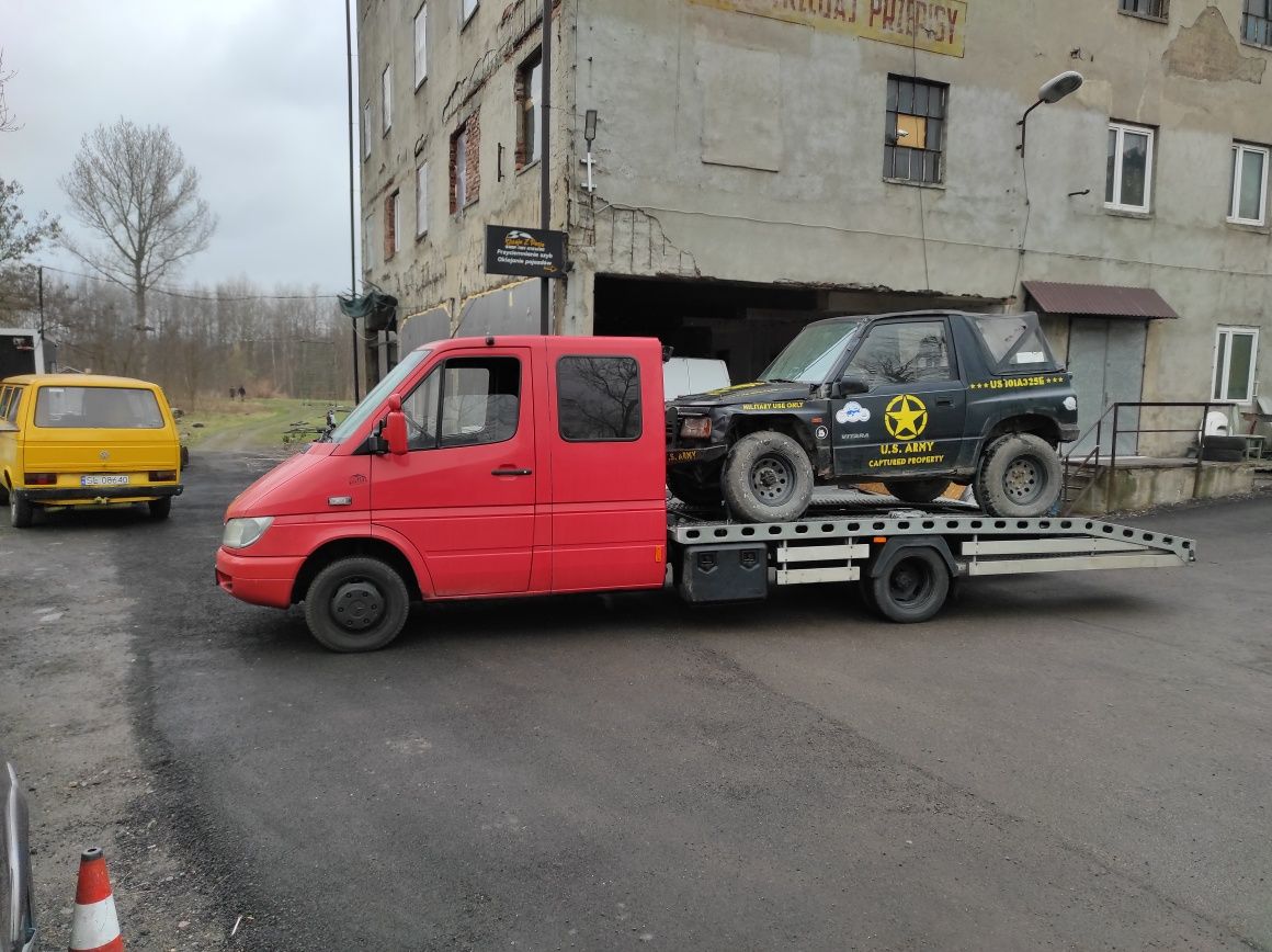 Pomoc drogowa holowanie autolaweta laweta a1 a4 dtś Katowice Mysłowice
