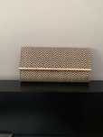 Clutch de mão padrão preto & creme