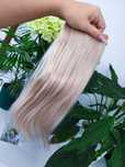 Włosy dziewicze rozjaśniane na biotaśmie jasny blond