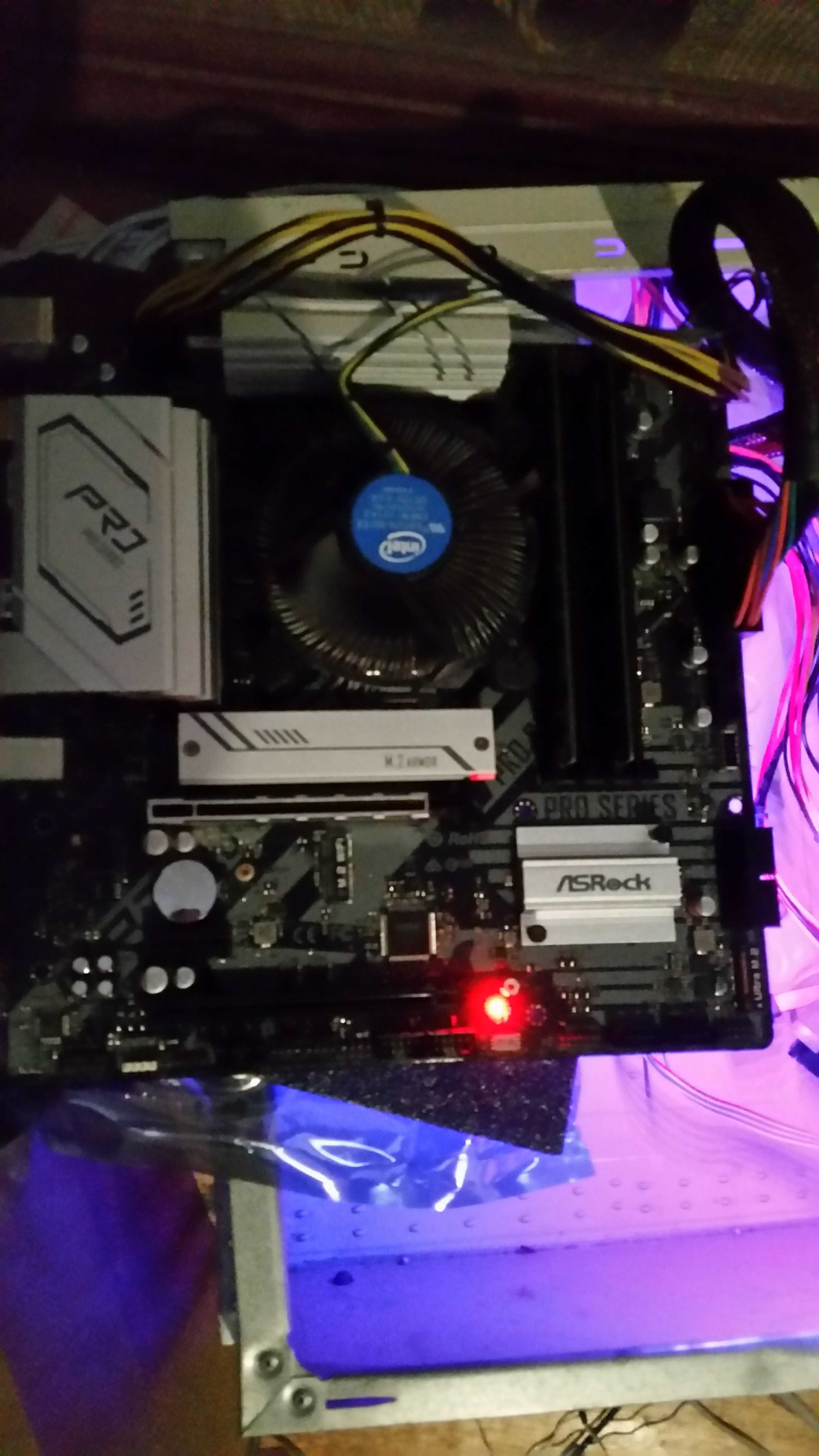 Материнська плата Asrock B560m Pro4