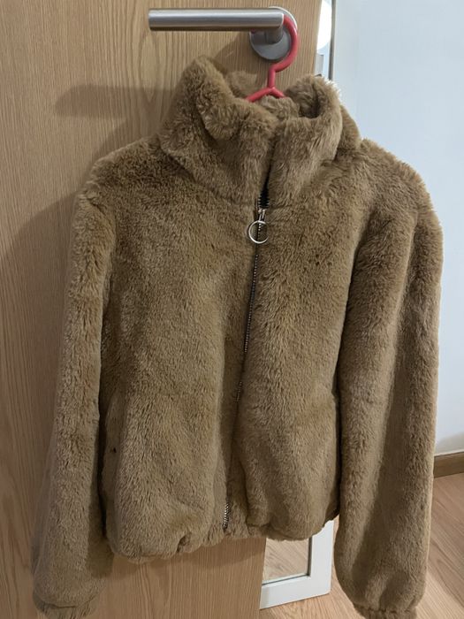 Casaco castanho pelo