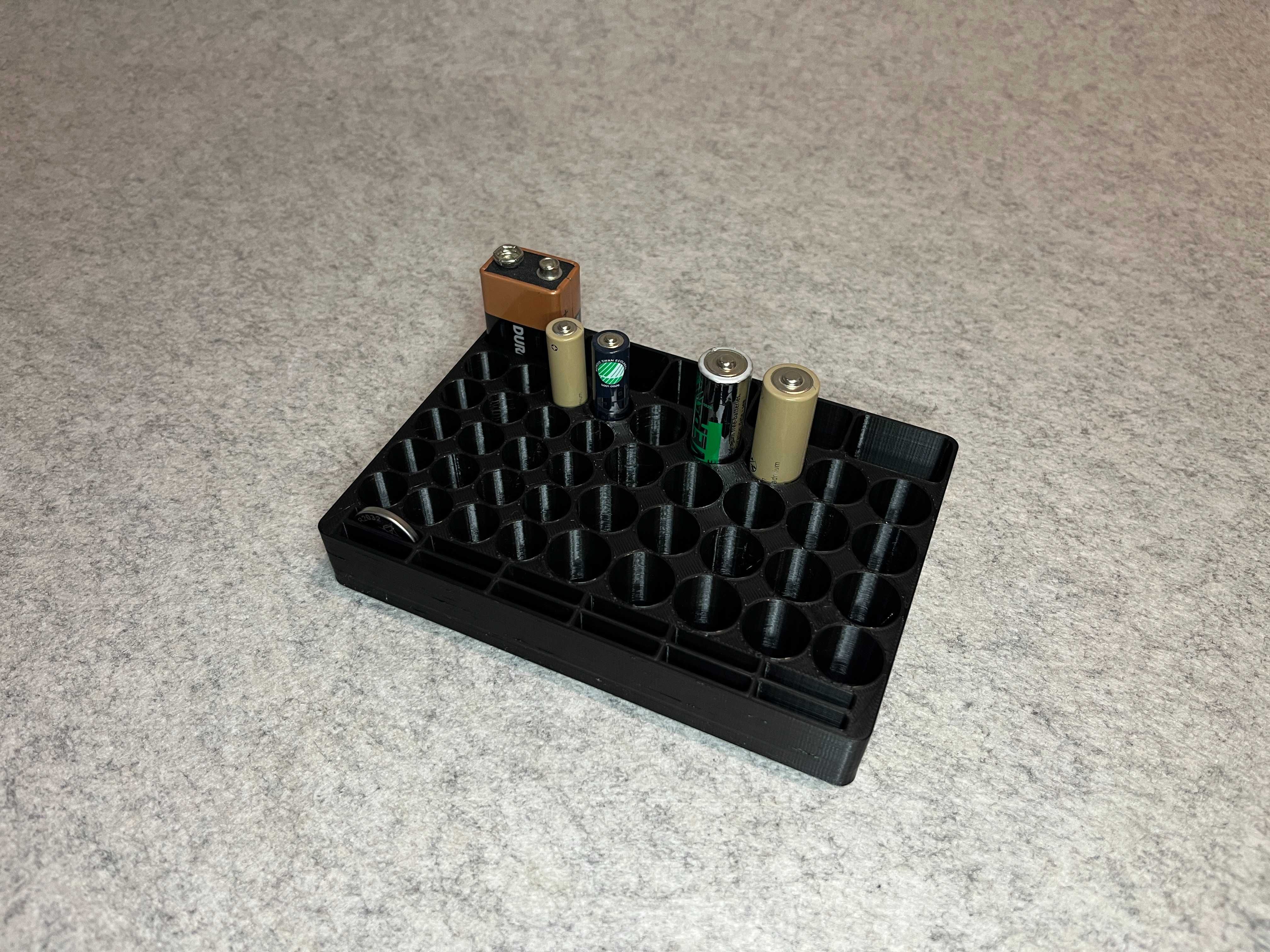 Stojak podstawka na baterie AA, AAA, 9V, CR2032
