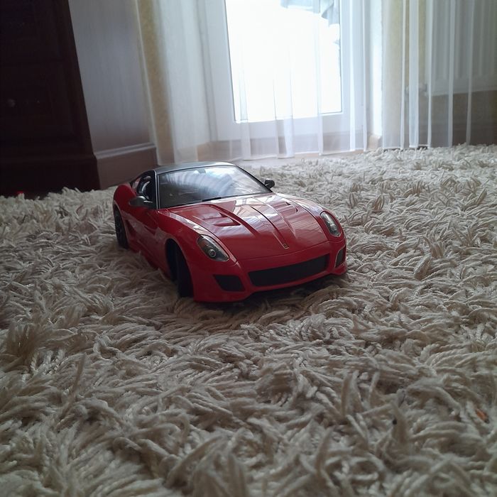 Іграшка на пульті управління  "порше"