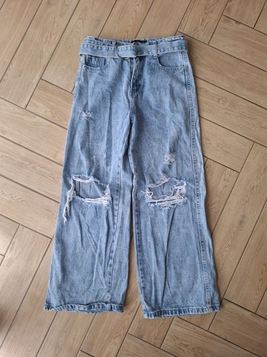 Jeansy  , szerokie z dziurami 152