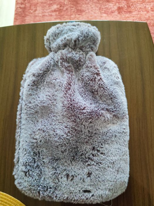 Nowy termofor z futekowa nakładką