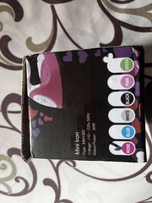 Sprzedam małe żelazko (różowy)