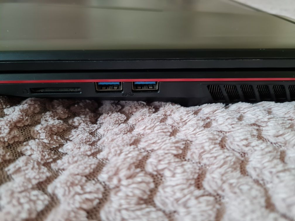 Laptop gamingowy MSI GL73 8RC – bardzo dobry stan