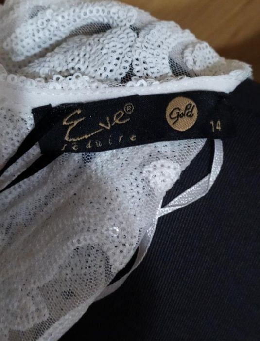 Блискуча ажурна сукня в паєтки