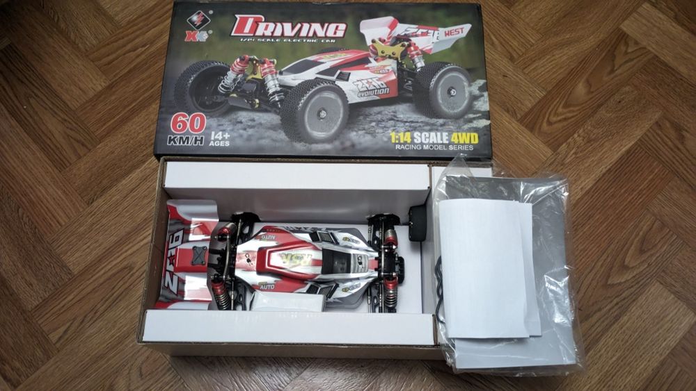 Велика радіокерована швидка баггі WL-Toys 144001 4WD 1/14 красна