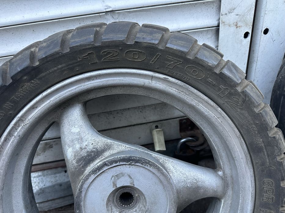 Колесо скутер 120/70-12 (19шлицов)