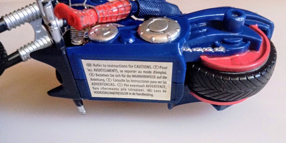 Spiderman articulado com a sua moto.Não é negociável.