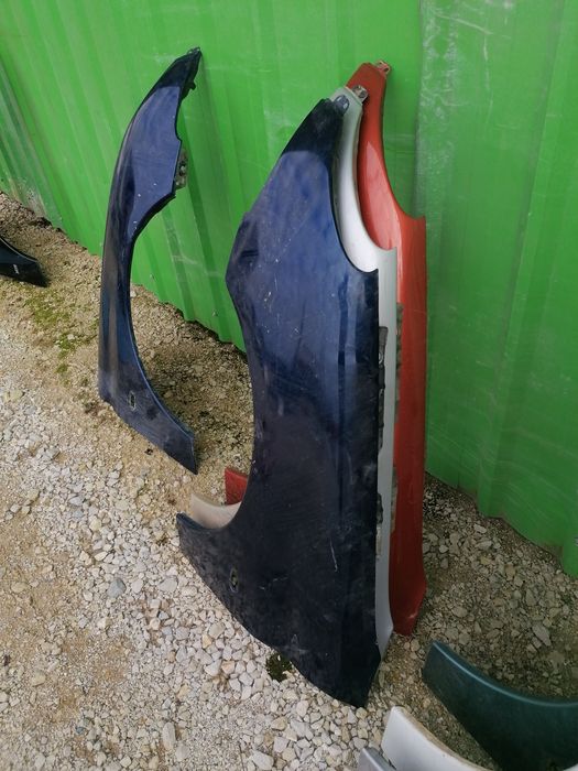 Guarda lamas peugeot 206