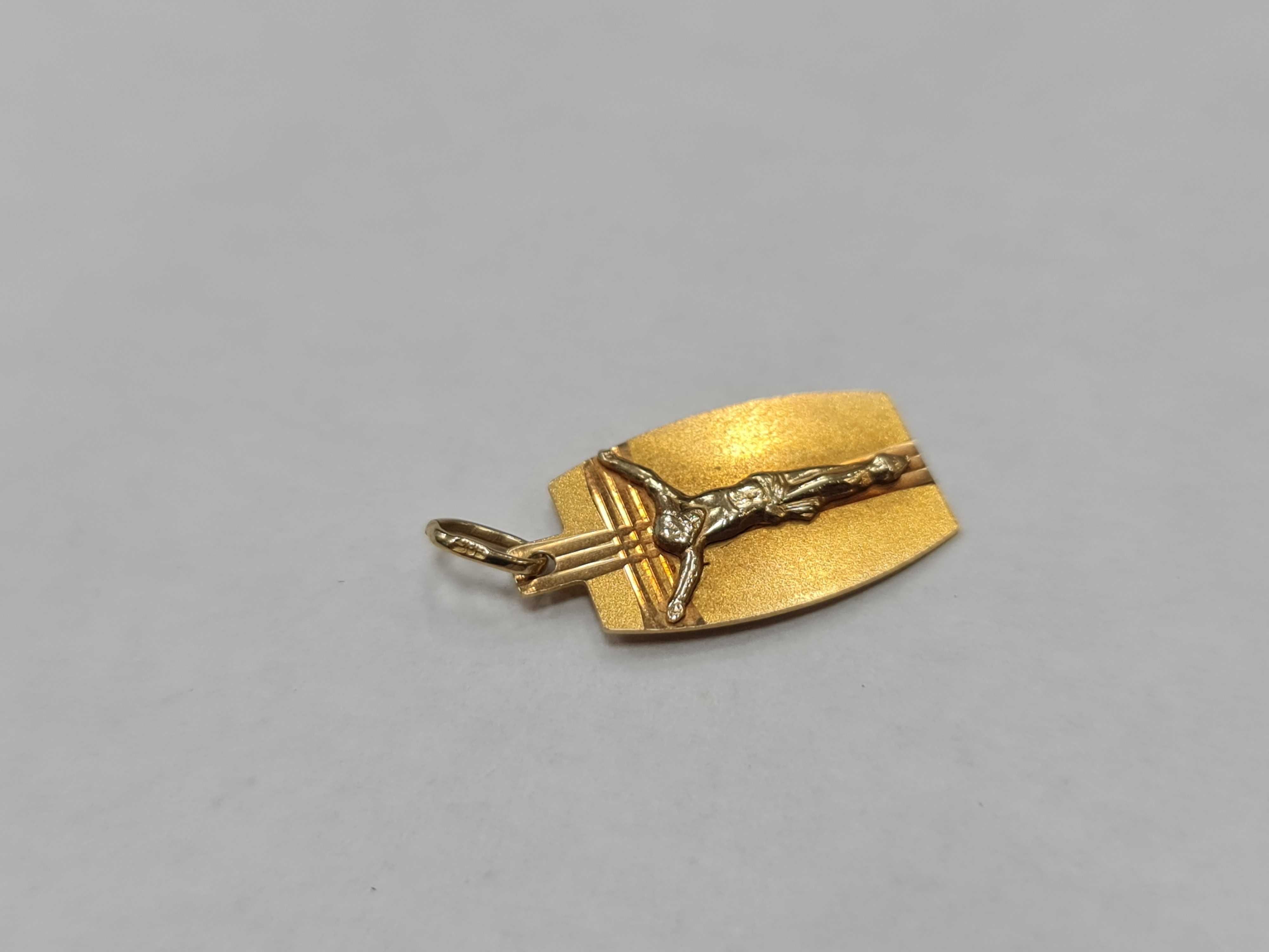 Ciekawy złoty krzyżyk / wisiorek/ męski / damski/ 585/ 0.97 gram