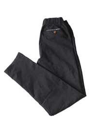 Eleganckie spodnie garniturowe na gumce r.152