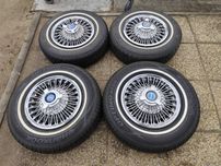 Ford Mercury koła oryginalne z kołpakami opony z białym paskiem