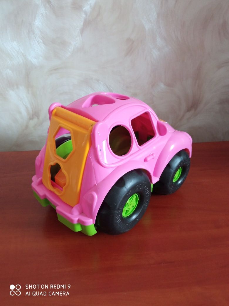 Машинка рожева сортер