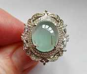 Серебряное кольцо с аквамарином кошачий глаз (берилл)6.68ct и топазами