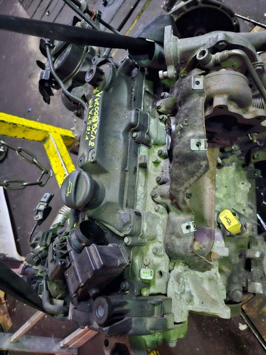SILNIK 8V2QB007AA DV4C FORD FIESTA MK7 11 1.4 HDI