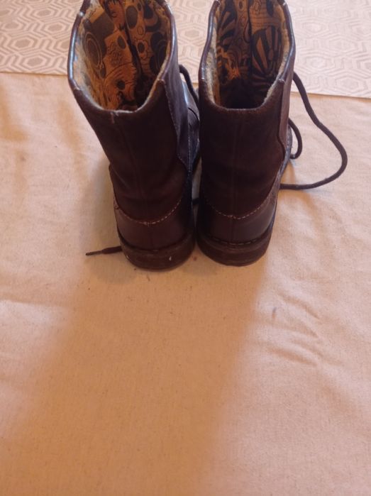 Botas pelo tornozelo