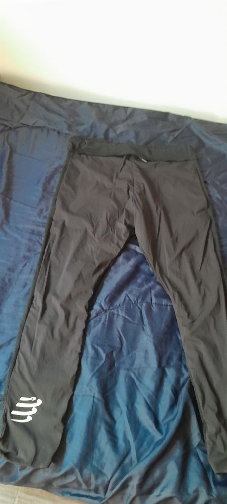 Spodnie biegowe Compressport.