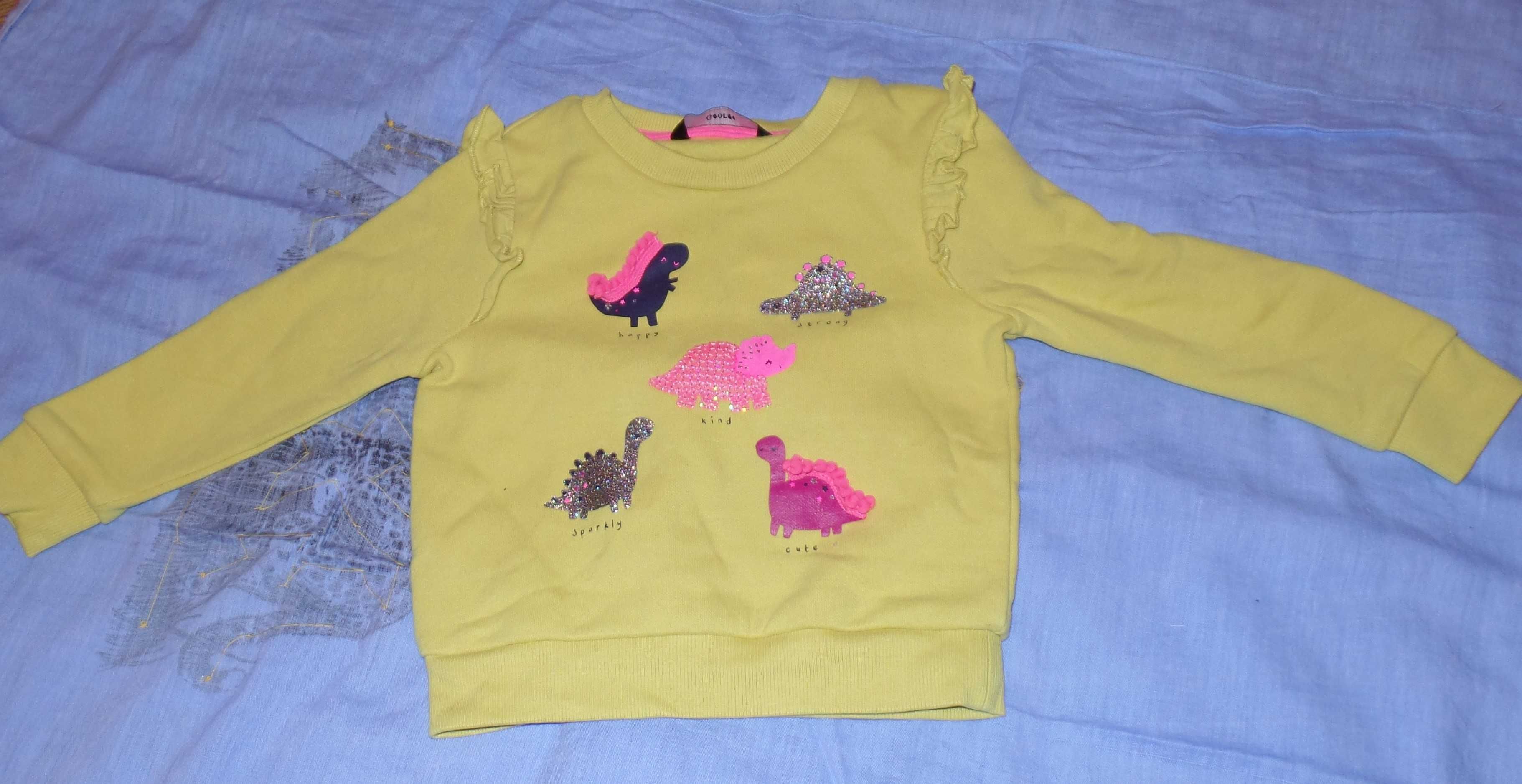 Żółta bluza dla dziewczynki z kolorowymi dinozaurami